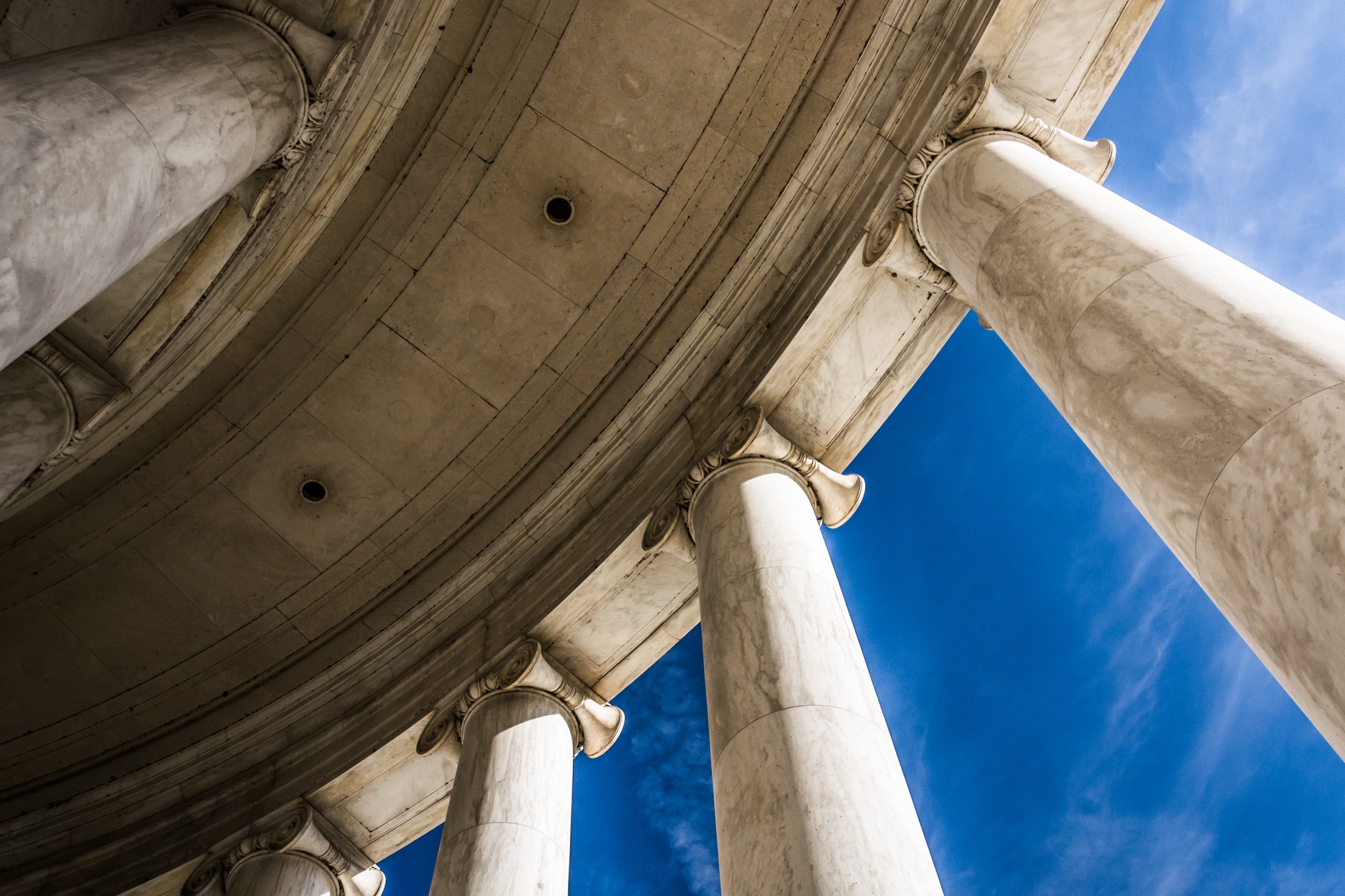 Looking up at the columns of the Thomas Jefferson Memorial