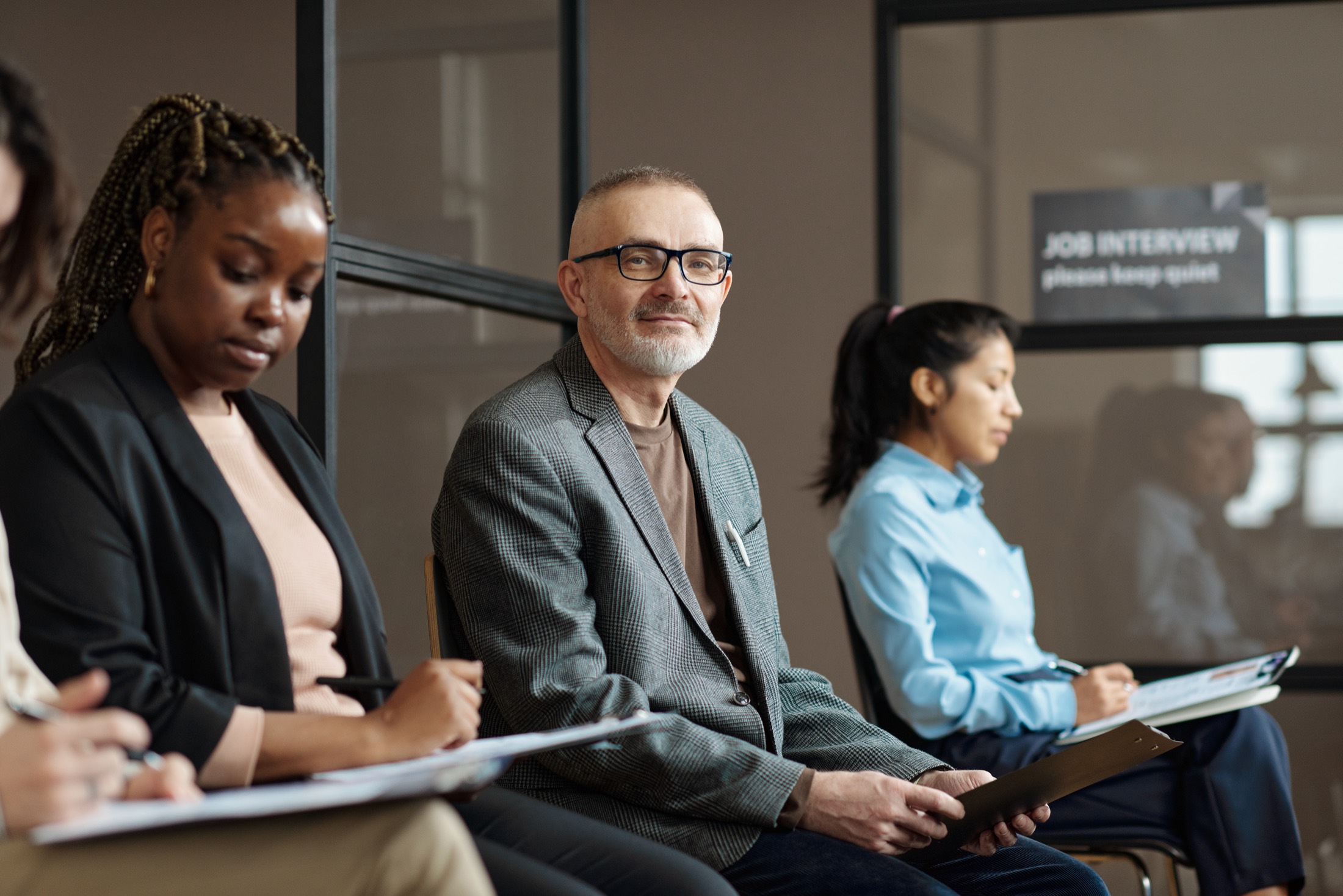 A candidate preparing for a new job, seated in an office