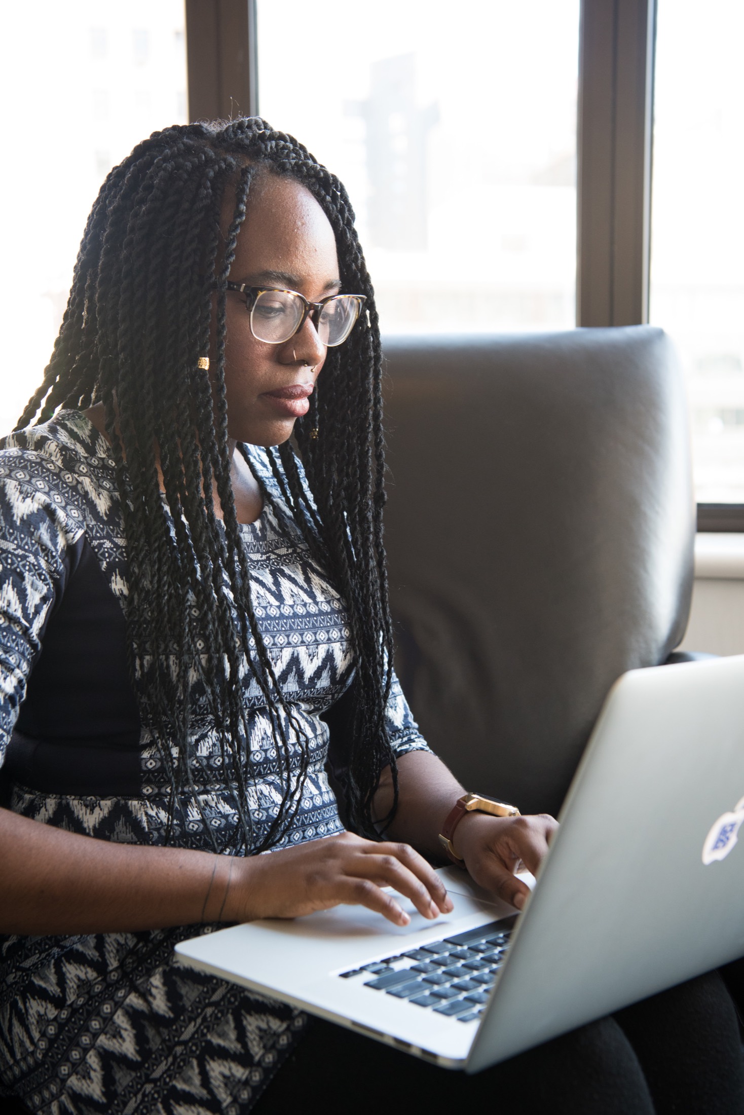 A student working on a laptop